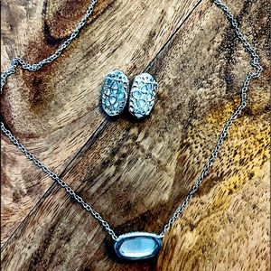 Kendra Scott Ellie Lux post earrings with light blue illusion stones.